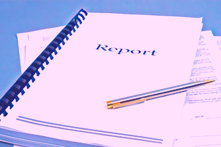 A bound report with a pen atop it